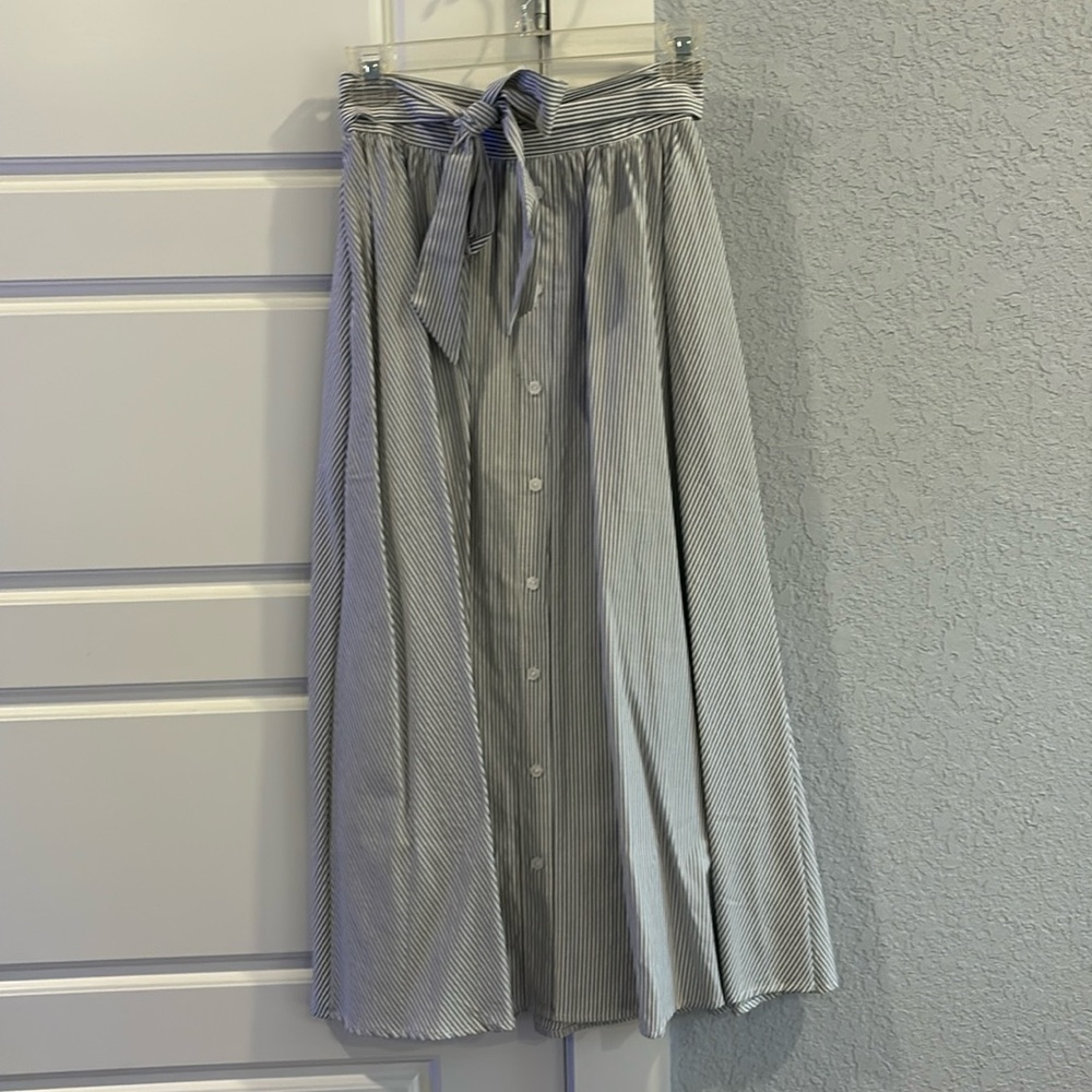 My sticker size small white with grey striped long skirt